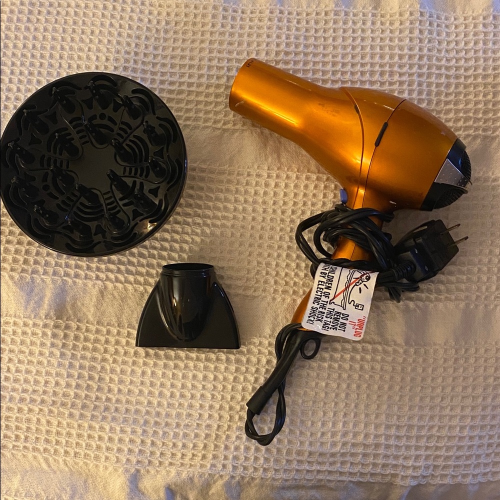 Orange and Black Hair Dryer with Attachments